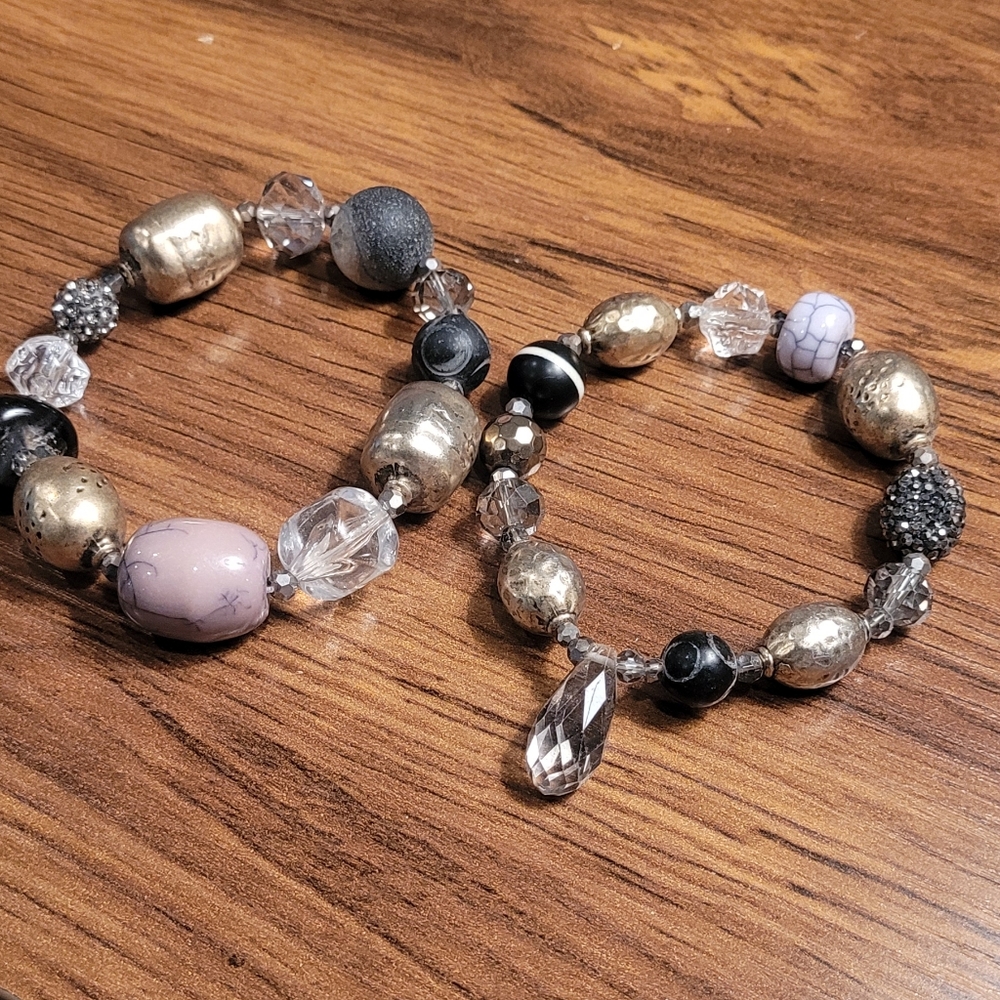 Two Elegant Gold and Black Beaded Bracelets (on elastic).